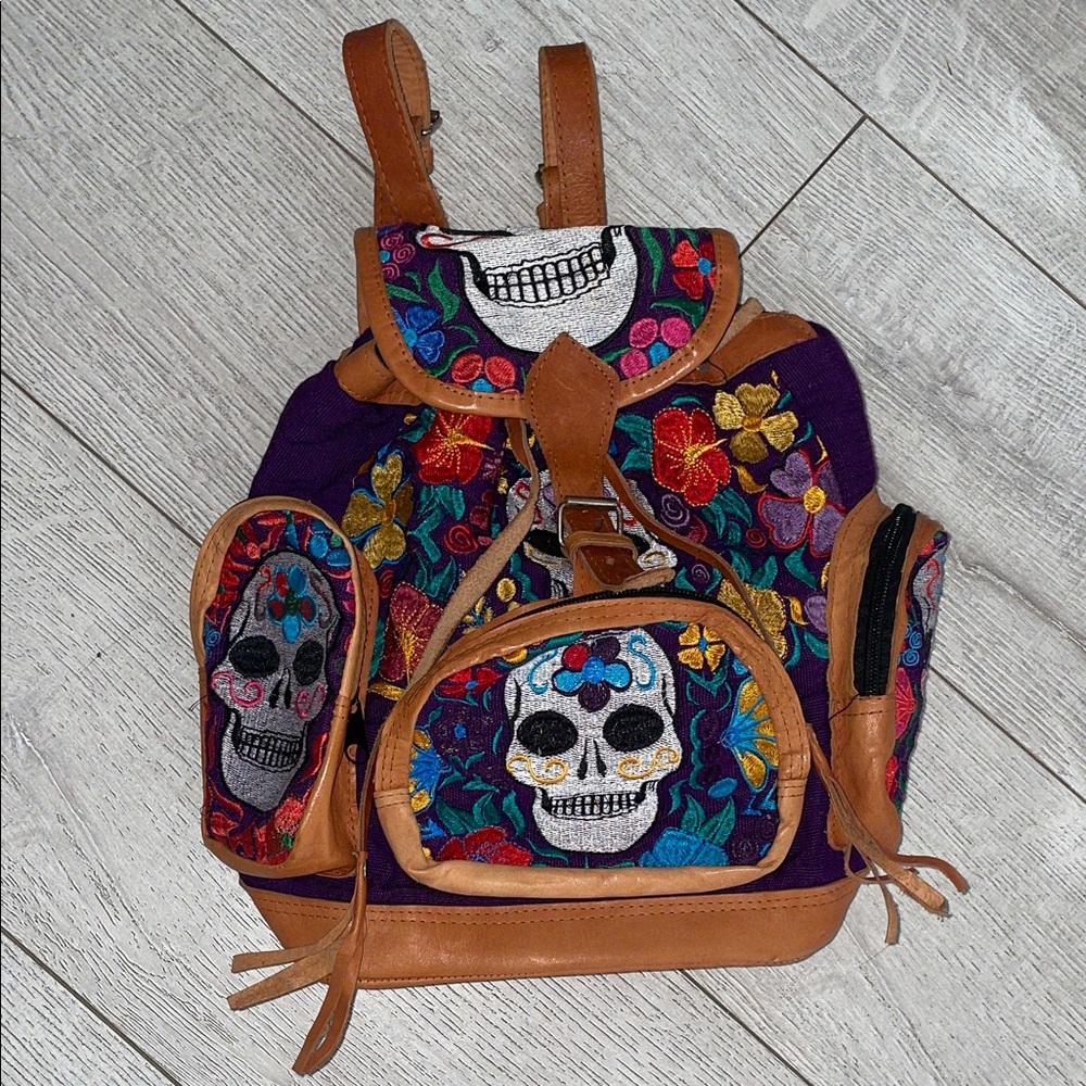 Embroidered Skull Backpack with Floral Design leather woven canvas Dia de muerto